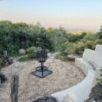 sitting area for party with metal fireplace