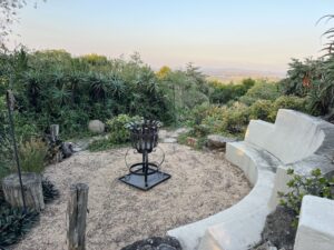 sitting area for party with metal fireplace