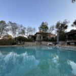 pool view with Moxie Manor in background