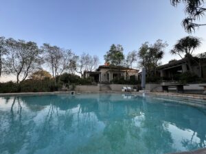 pool view with Moxie Manor in background